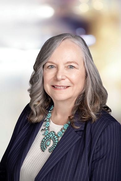 Portrait of Paula Fanning, REALTOR® | MRP | ABR® | CFSP | PSA | NRLUX.